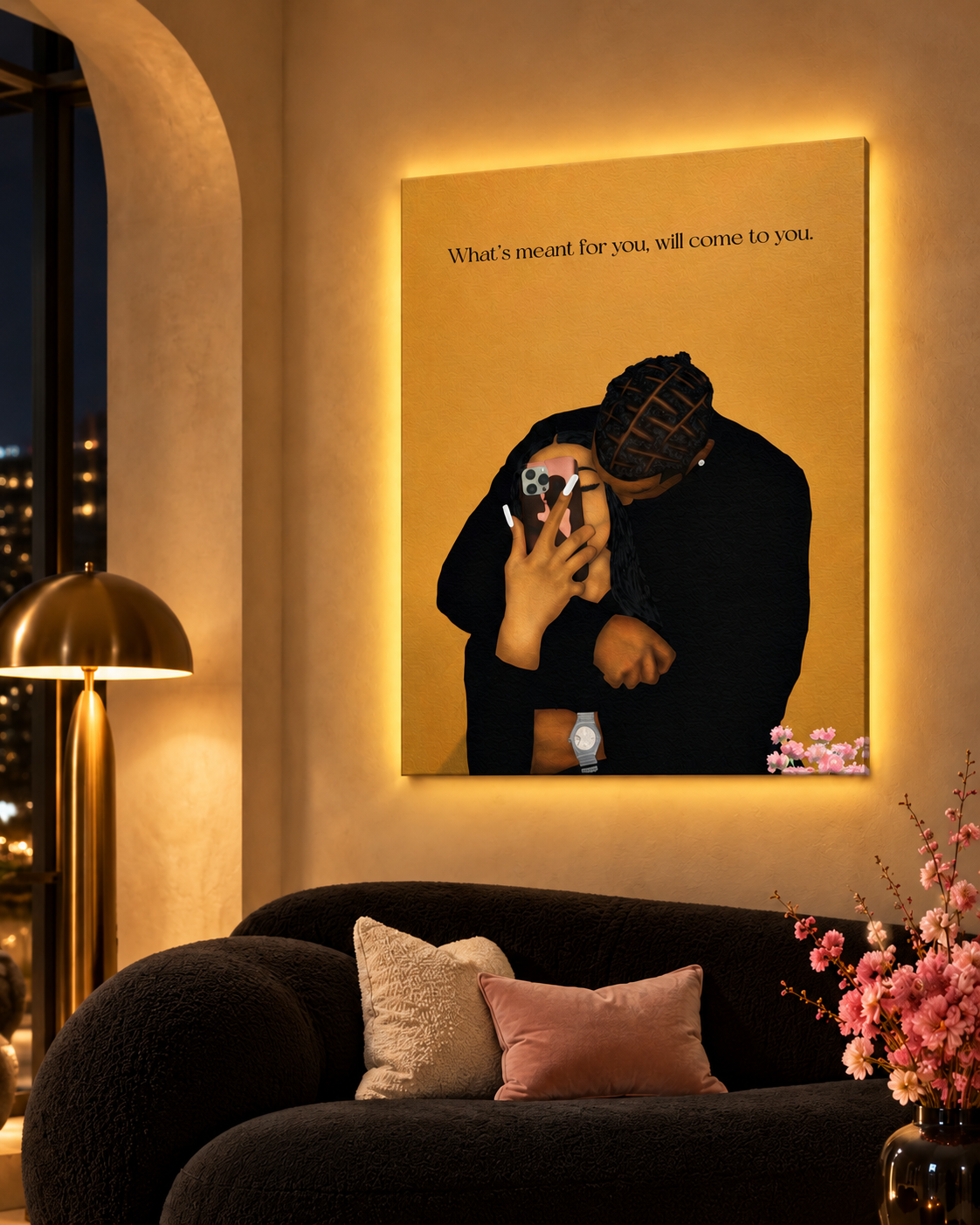 What's Meant For You canvas fully visible above a black sofa, cropped living room view